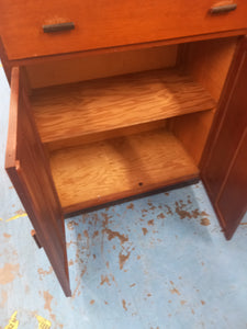 Storage cupboard with drawers