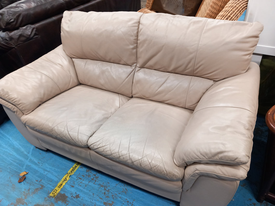 2 Seater Beige Leather sofa ** See Photos and description