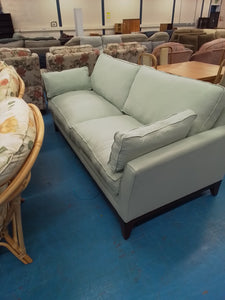 Factory return mint green sofa bed