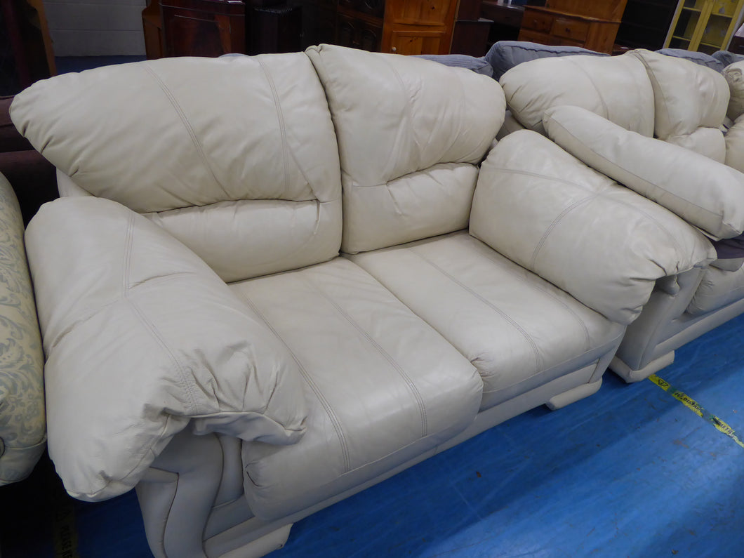 Two Cream Leather Sofas & Armchair