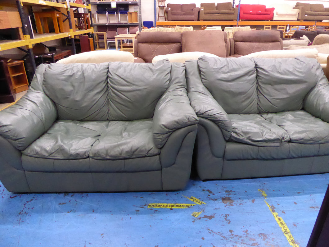 Green Leather Two x Two Seater Sofas