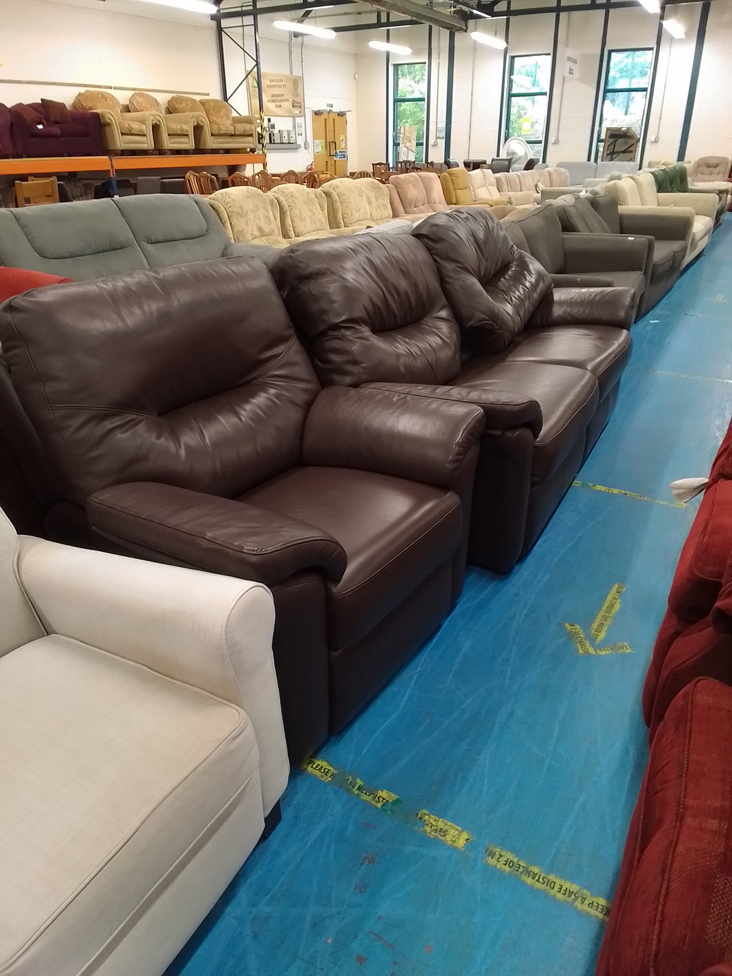 Brown Three Seater Sofa & Armchair