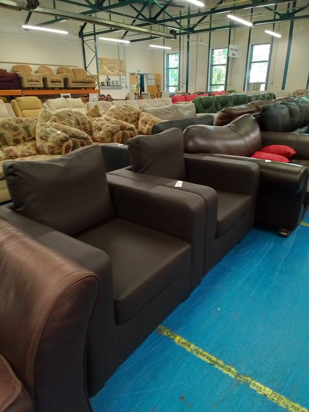 Pair of Black Leather Look Armchairs