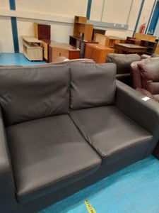 Black Leather Look Two Seater Sofa