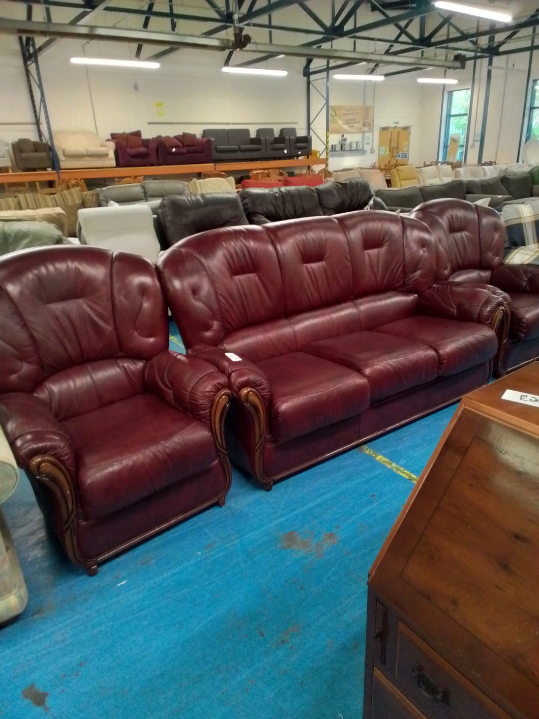 Burgundy Leather Three Piece Suite