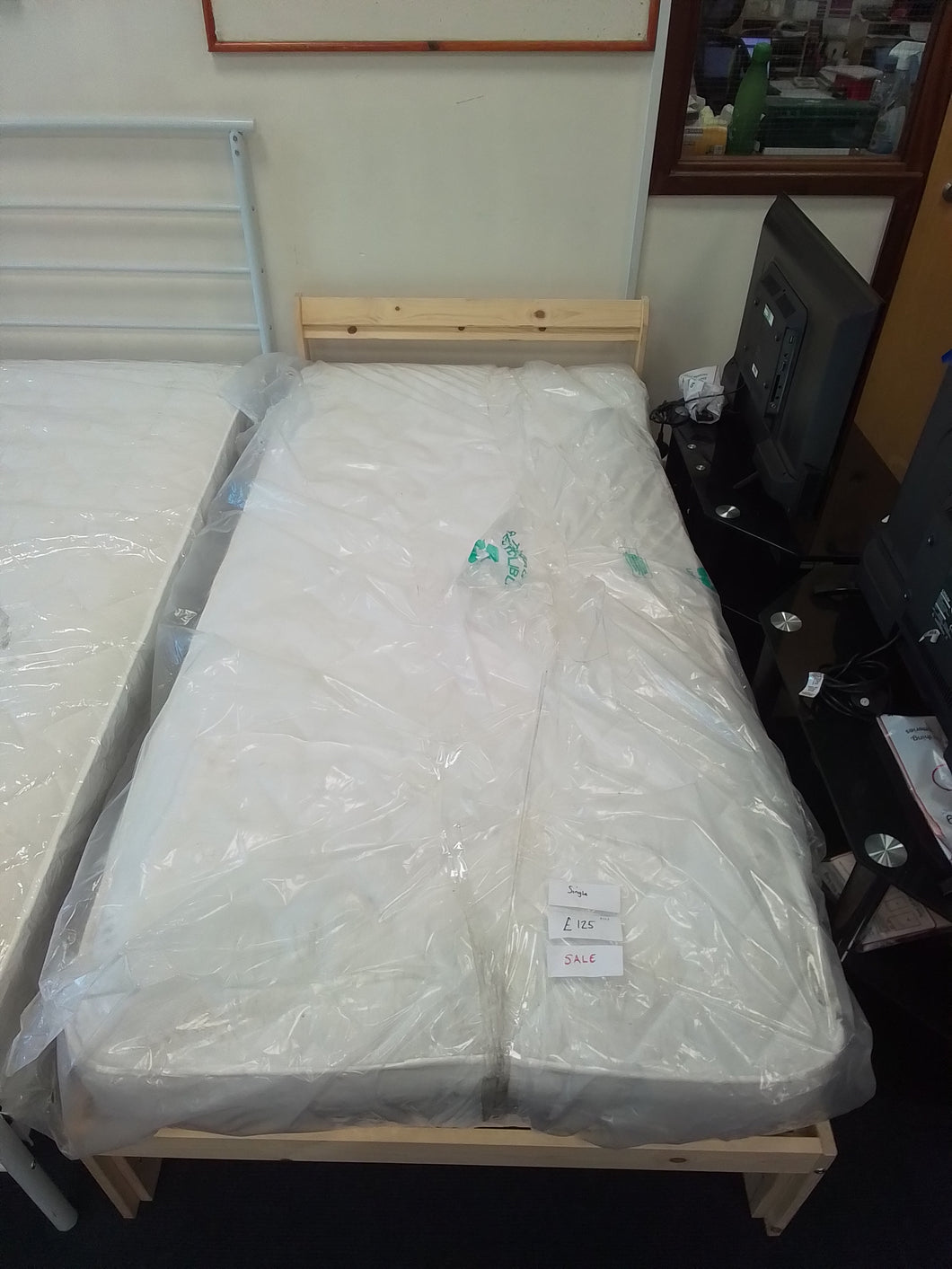 Single bed complete with factory return mattress