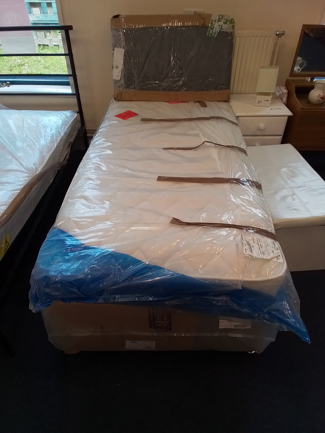 Single bed complete with factory return mattress