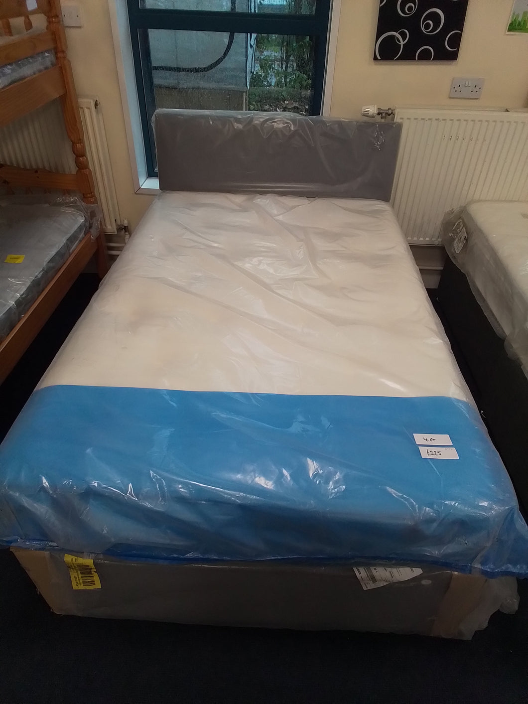 4ft Bed Complete with factory return mattress